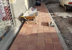 آغاز اجرای سنگفرش پیاده‌روهای خیابان شهید غلامی (تپلی باغ)